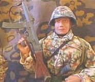 A hypothetical model reconstruction of 1946 Nazi German trooper with STG45 and M45 Stahlhelm with Leibermuster cover and smock. Note that neither helmet covers nor smocks were produced in this camouflage in reality[14]