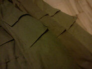 Comparison of different colored M88 Afghanka uniforms, from left to right: sage green, glass fabric and khaki[19]