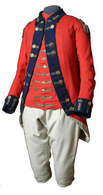 A Loyalist Officer's Coatee, breeches and waistcoat for Light Infantry Company. In 1779, Loyalist soldiers received scarlet uniforms, similar to those worn by British regulars. This one belonged to Lieutenant Jeremiah French of the King's Royal Regiment of New York. The gold buttons bear the regiment's initials. They are arranged in pairs to indicate that French belonged to the 2nd battalion of the regiment. This is one of the oldest complete uniforms in Canada. Image courtesy of Canadian War Museum