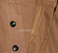 Trousers fastening buttons