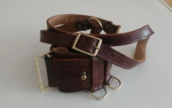 A closer view of the belt, strap and twin hand grenade D-rings.