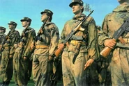 Members of the Zbor narodne garde (ZNG) at the football stadium (Zagreb, Kranjčevićeva street) wearing Romanian AK rifles, bayonets and the "sniper" suit