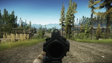 Optional Trijicon ACOG backup rear sight on top in use