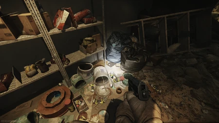 Third journal spawn: Tucked under a blue trash bag on the ground next to the shelf in the back left