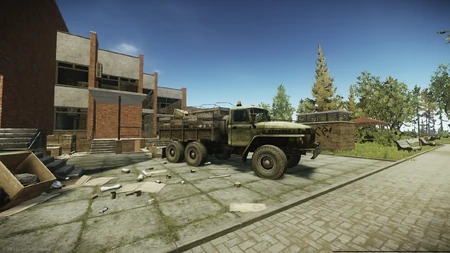 The first UN truck is located on the north side of the health resort, next to the tennis court.