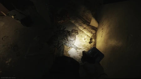 First journal spawn: Tucked under the jacket pile on the ground to the right after entering