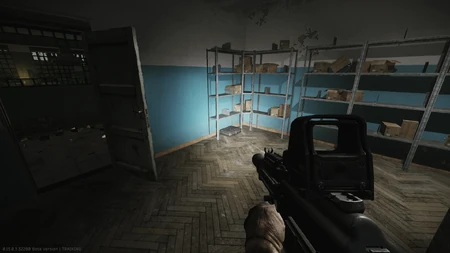 1: In the storage room, on the floor to the left after entering