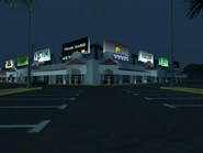 Vista del Creek Shopping Mall en la noche.