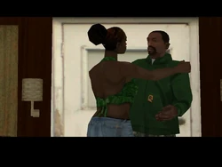 Kendl recibiendo a Carl en la caravana.