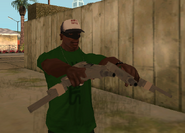 Carl Johnson con dos micro subfusiles.