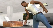 Introducción (GTA SA) 2.jpg (47 kB) CJ tomando su maleta en el aeropuerto de Los Santos