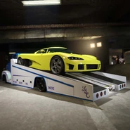 GTA+-Mayo2023-GTAOee-Slamtruck3.jpg (168 kB) Una imagen promocional del Slamtruck montando un Entity XF de GTA+ en Mayo de 2023.