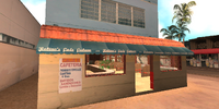 Parte frontal de local, con la entrada.