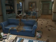 La sala toda sucia y desordenada.