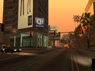 AutovíaLS17.jpg (162 kB) El banco de crédito y comercio de San Andreas y al costado publicidad de Zip