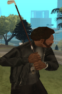 Carl Johnson con un palo de golf.