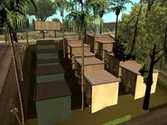 Imagen de varias viviendas del barrio, aquí se puede encontrar uno de los 100 graffitis.