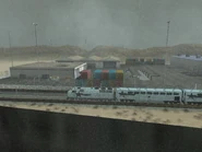 Rockshore East 5.jpg (68 kB) El tren pasando por Rockshore East en plena lluvia.