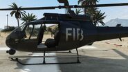 El costado del helicóptero, nótese el logo del FIB.