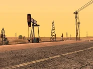 AutoviaLV22.jpg (122 kB) Gran parte de la Autovía pasa por "Octane Springs" lleno de bombas de extracción de petróleo