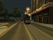 El tranvía, tiene el nombre de este barrio en el techo.