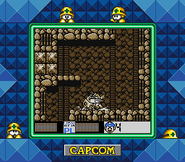 Mega Man utilizando el disparo cargado completo del Break Dash en "Mega Man V", Super Game Boy.