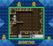 Mega Man utilizando el disparo cargado del Break Dash para destruir 1 muro especial en "Mega Man V", Super Game Boy.
