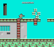 Mega Man utilizando Thunder para destruir 1 bloque de aguante en "Mega Man", NES.
