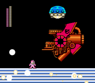 Platillo volador saliendo de una destruida Wily Máquina 2 en "Mega Man 2", NES.