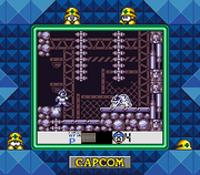 Mega Man utilizando Mega Claw para ejercer daño continuo en un Hell Metall DX.
