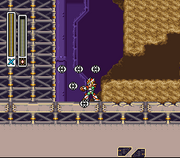 Mega Man X utilizando el Silk Shot para reunir Cápsulas de Vida en la "Base del Desierto" en "Mega Man X2", SNES.