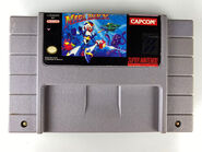 Cartucho de Super Nintendo Entertainment System de "Mega Man X".