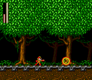 Mega Man usando el Atomic Fire (Carga 2) en "Mega Man: The Wily Wars", Sega Genesis.