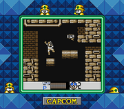 Mega Man utilizando Magic Hand para capturar 1 Chip P grande.