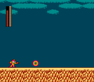 Mega Man usando el Atomic Fire (Carga 1) en "Mega Man 2", NES.