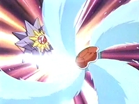 Squirtle de Ash usando hidrobomba contra el Starmie de Rudy.