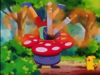 Ash y Tracey paralizados por el paralizador de un Vileplume.