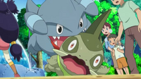 EE14 Gible mordiendo a Axew