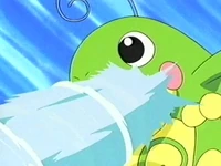 Politoed de Misty usando pistola agua.