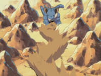 Nidoqueen de Gary usando golpe roca.