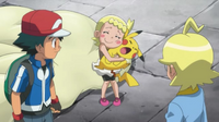 EP805 Clem apretando a Pikachu