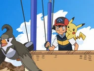 Ash dirigiendo a Staravia desde el globo.