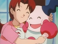 Delia con su Mr. Mime.