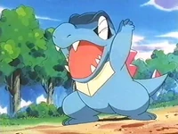 Totodile de Ash usando cara susto.