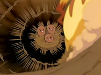 Dugtrio de Katie usando bucle arena contra el Pikachu de Ash.