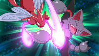 Scizor de McCann usando doble golpe contra el Gliscor de Ash.