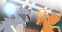 PO03 Mega golpe.png (867 kB) Rhydon de Giovanni y Charizard de Rojo usando megapuño en el PO03.