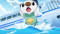 Oshawott nadando en el mar.