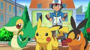 Snivy junto a Tepig y Pikachu.