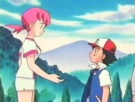 Whitney/Blanca entregando la medalla Simple/Planicie.